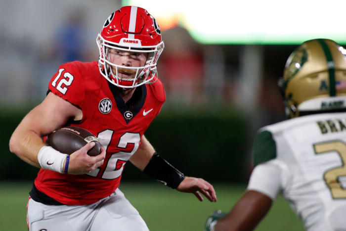 Georgia quarterback Brock Vandagriff runs with the ball during the second half against UAB in Athens, Ga., on Sept. 23, 2023.